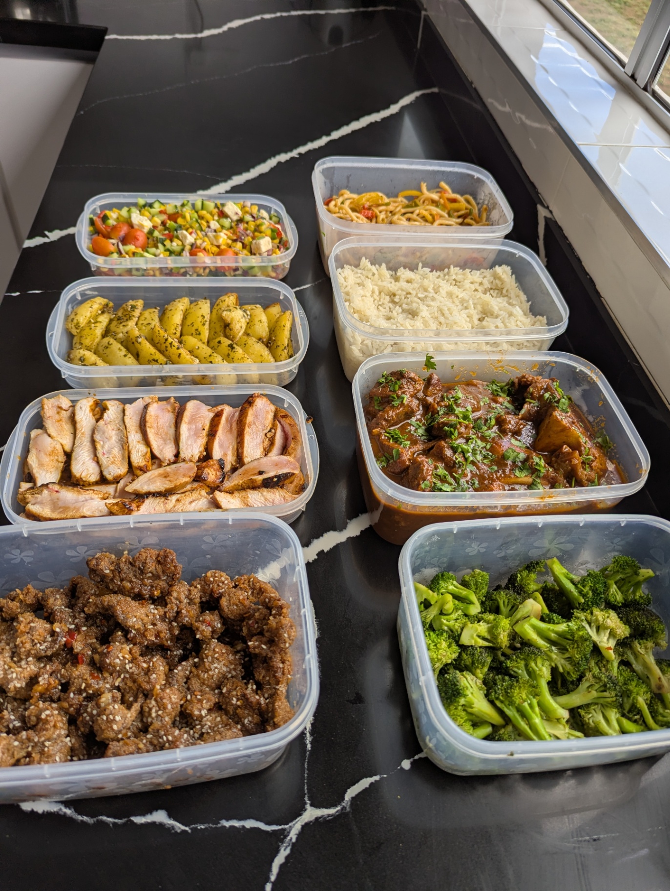 Full weekly meal prep spread with curry, chicken and sides